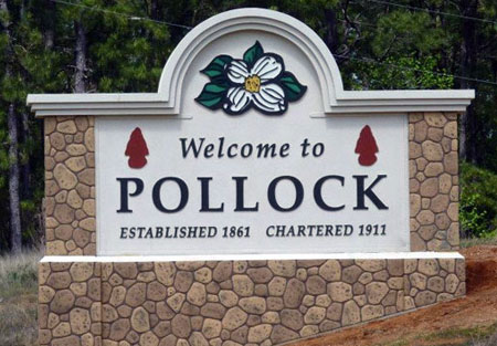 Faux stone monument sign at a business entrance