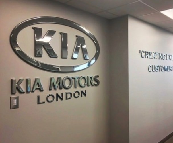 Custom office reception sign using premium mixed materials